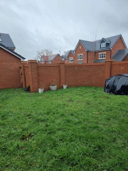 Porcelain patio, stepping stone path, sleeper planting bed  before works — Chorley