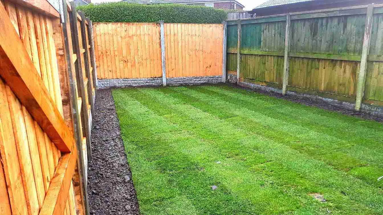 Rear fence and turf at landscaping job in Leyland,.
