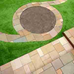 Sandstone paving circle and patio area