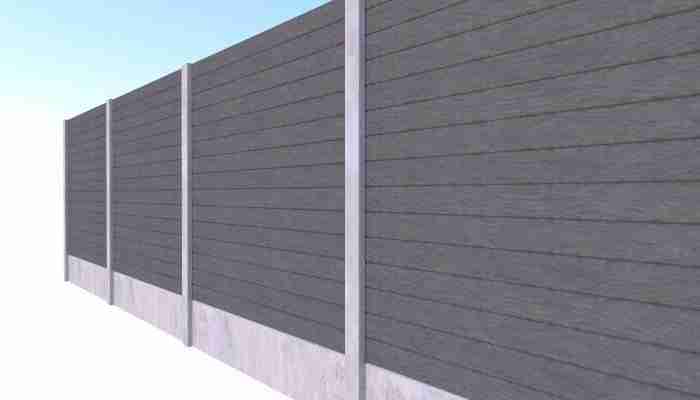 Grey composite fence panels in concrete posts