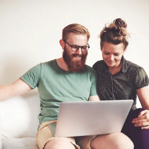 People looking at a garden design on a laptop